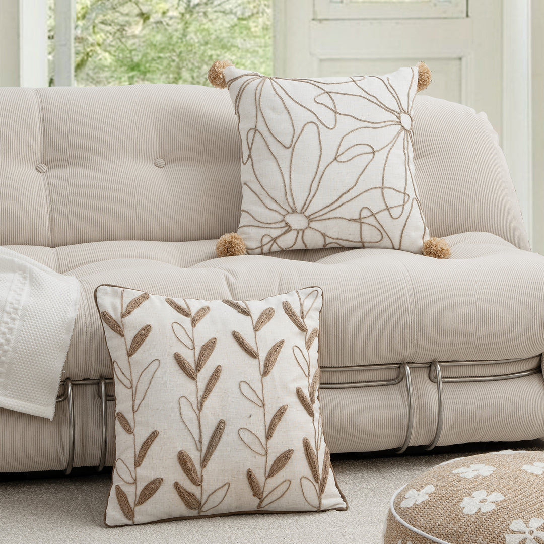 Decorative linen cushion with hand-stitched jute application