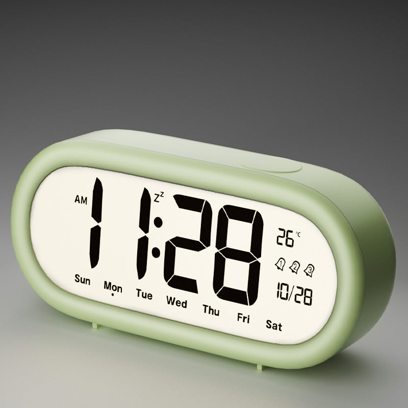 Digital alarm clock with temperature display and alarm function