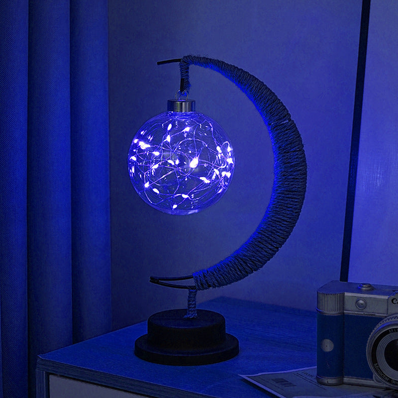 Decorative glass apple LED table lamp with moon-shaped rope-wrapped stand