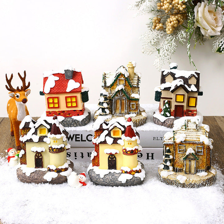 Illuminated Christmas village made of ceramic