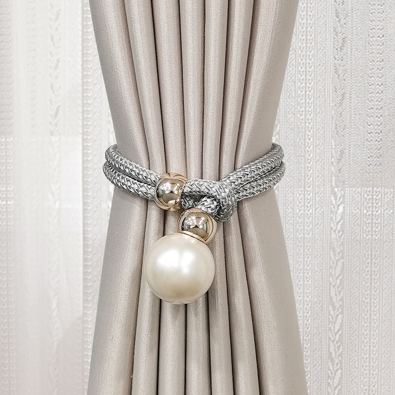 Elegant curtain tieback with decorative pearl