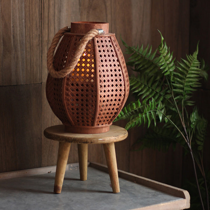 Decorative lantern holder made of natural material