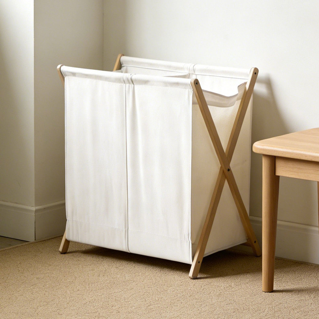 Laundry basket with practical folding mechanism