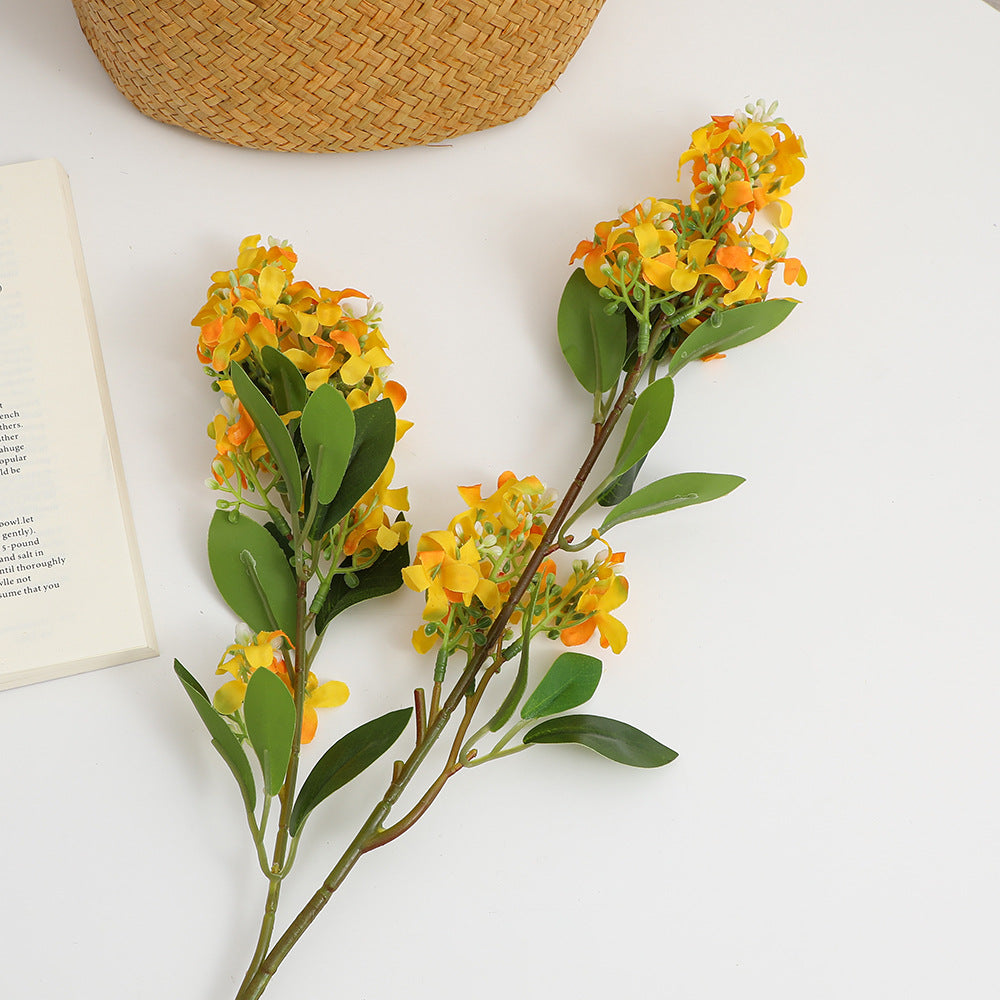 Artificial flower branch with bright flowers