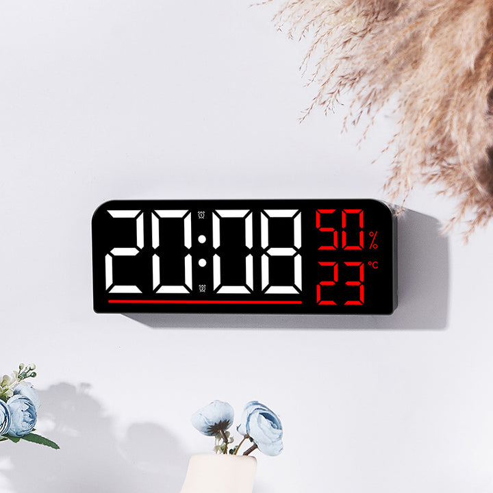 Digital alarm clock with hygrometer and temperature display