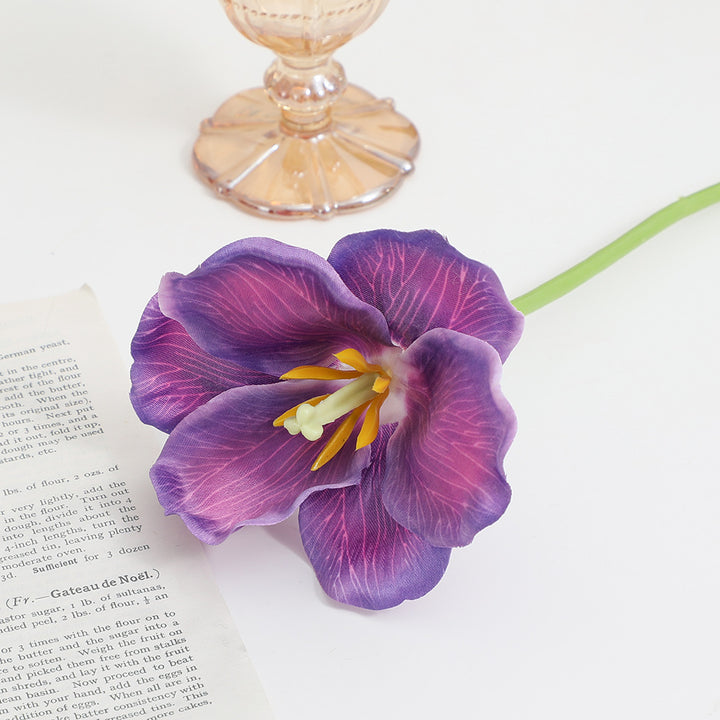 Artificial orchid flower branch with intricately detailed flowers
