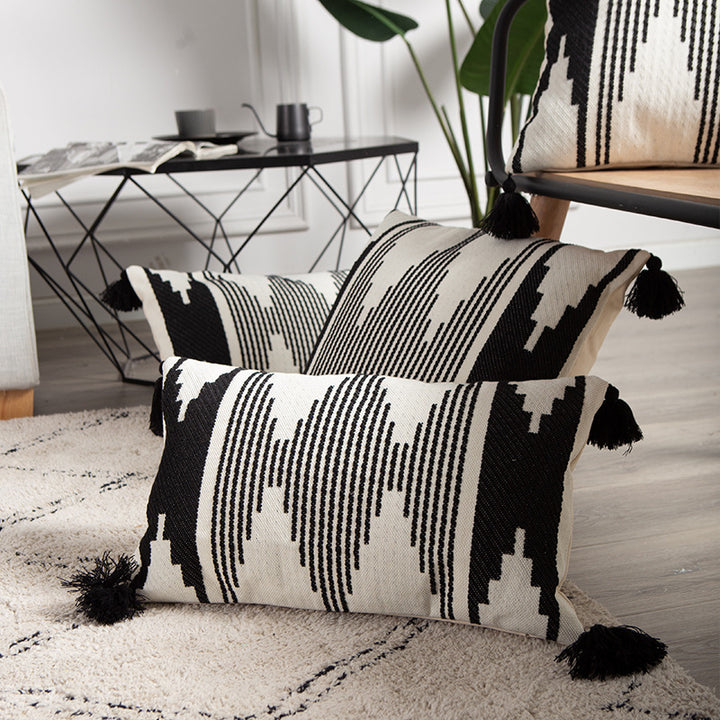 Rectangular Jacquard lumbar cushion cover with geometric ethnic relief and decorative tassels