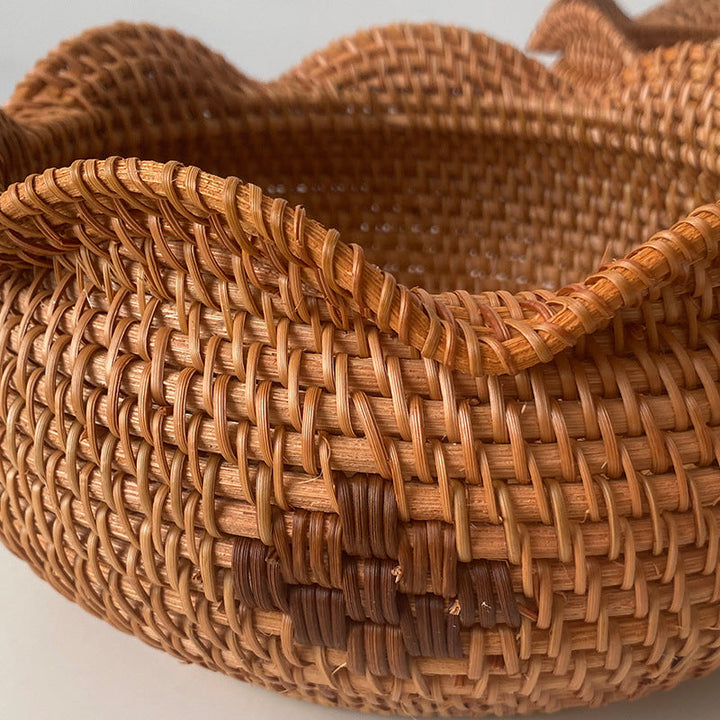 Handcrafted storage basket with wavy edge