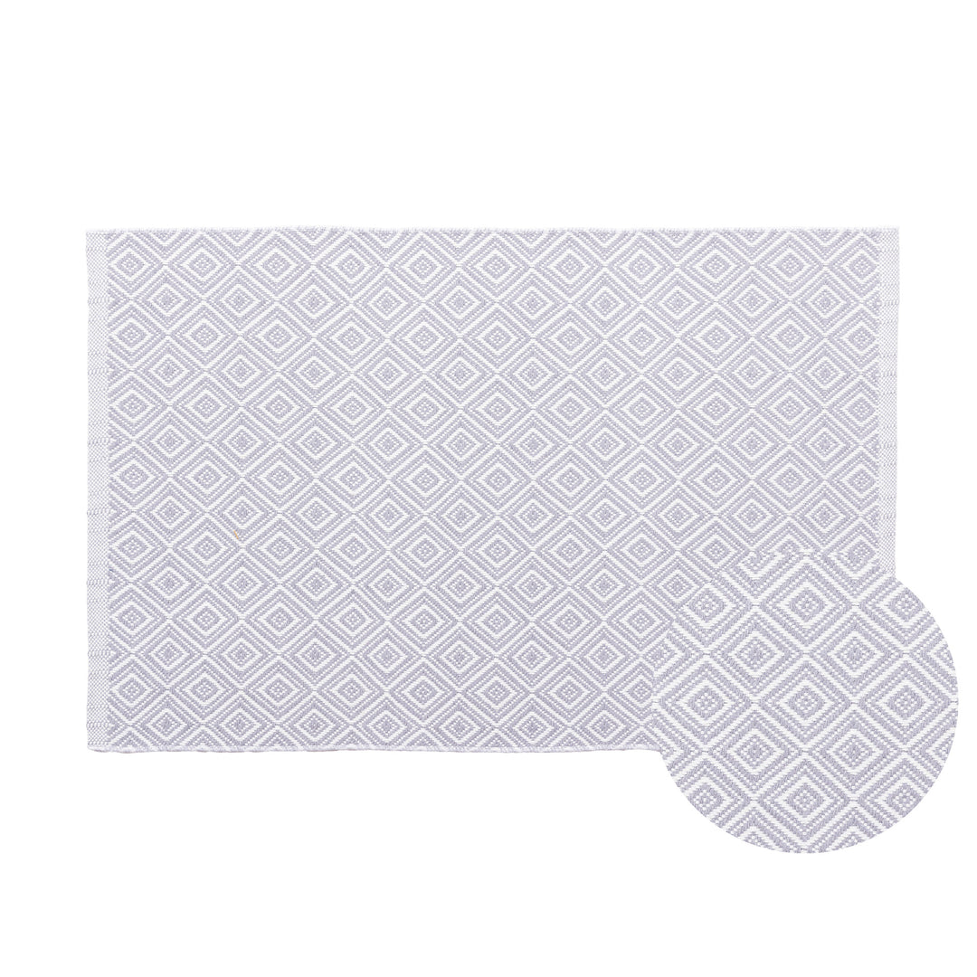 Modern runner made of handwoven cotton with geometric diamond pattern