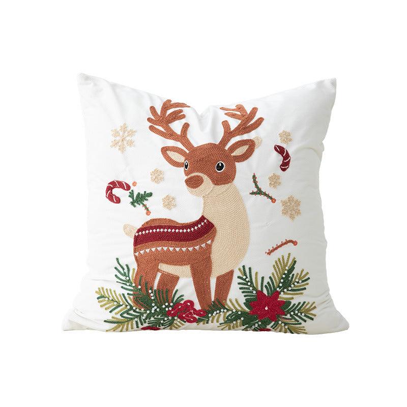 Festive embroidered decorative pillow with reindeer motif and removable cover