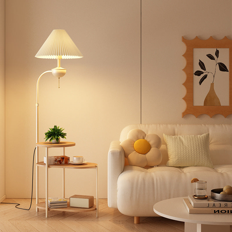 Multifunctional floor lamp with integrated side table