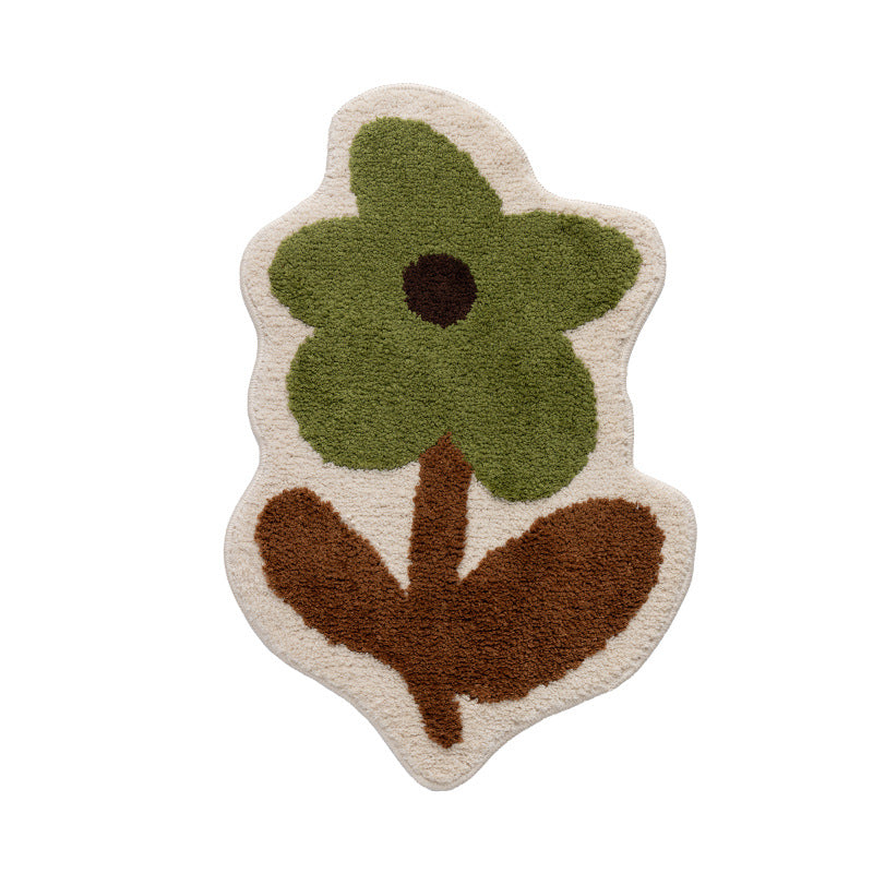 Flower-shaped hand-tufted bath mat with voluminous pile and non-slip latex backing