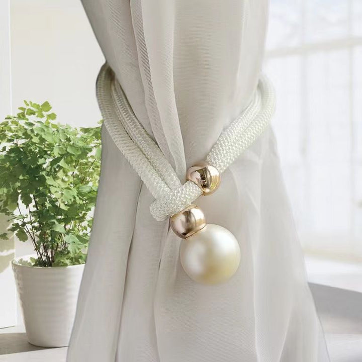 Elegant curtain tieback with decorative pearl