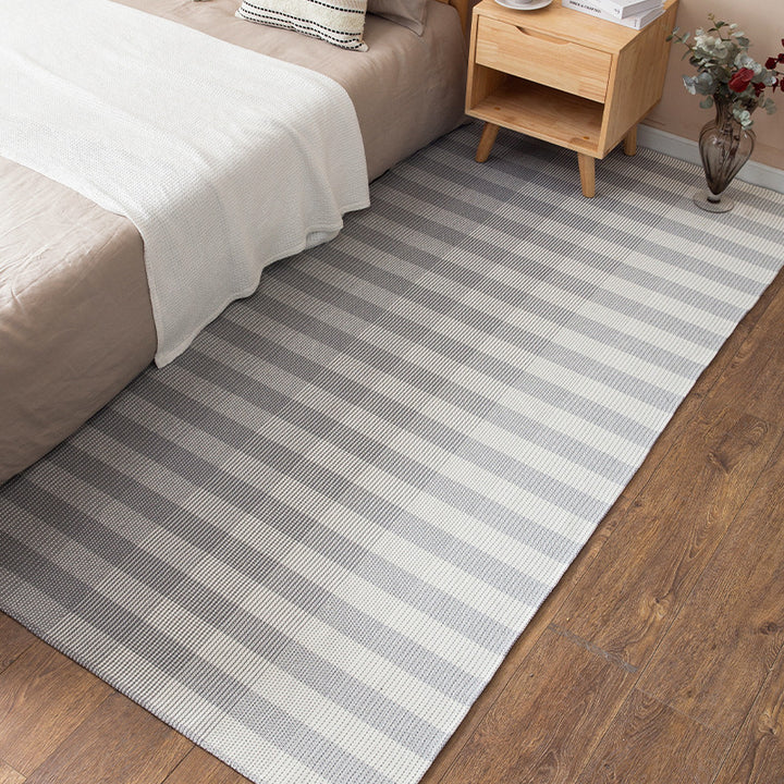Flat-woven floor rug for bedrooms and living spaces with striped texture and low pile