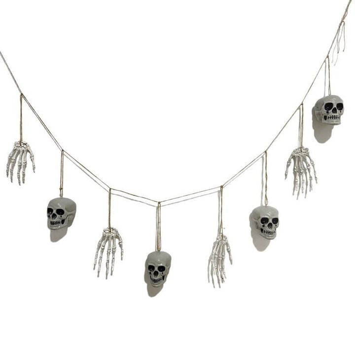 Decorative garland with skeleton hands