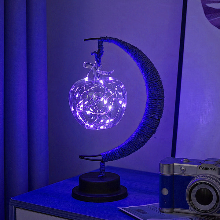 Decorative glass apple LED table lamp with moon-shaped rope-wrapped stand