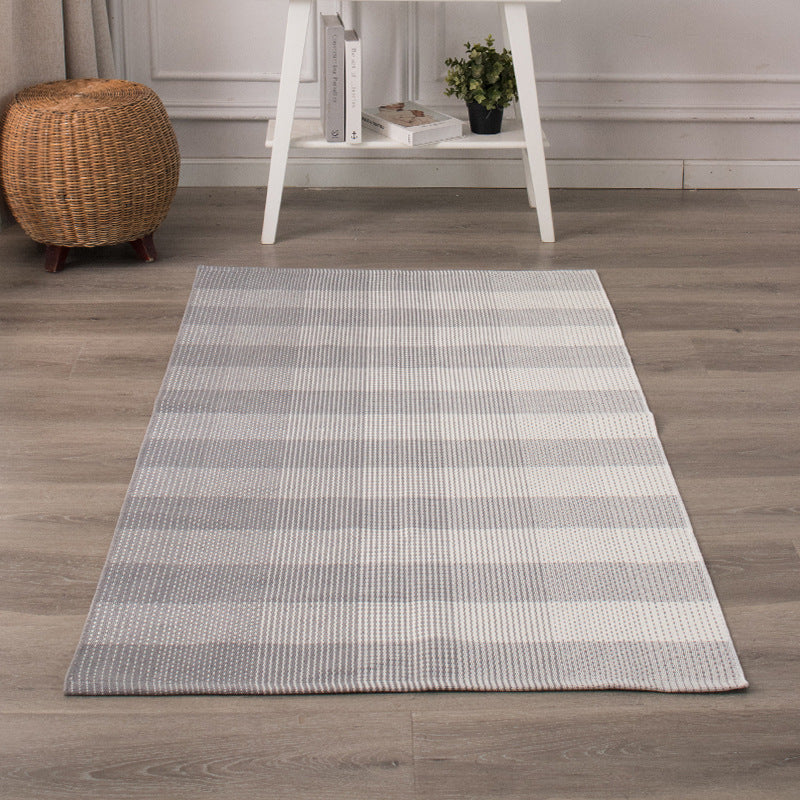 Flat-woven floor rug for bedrooms and living spaces with striped texture and low pile
