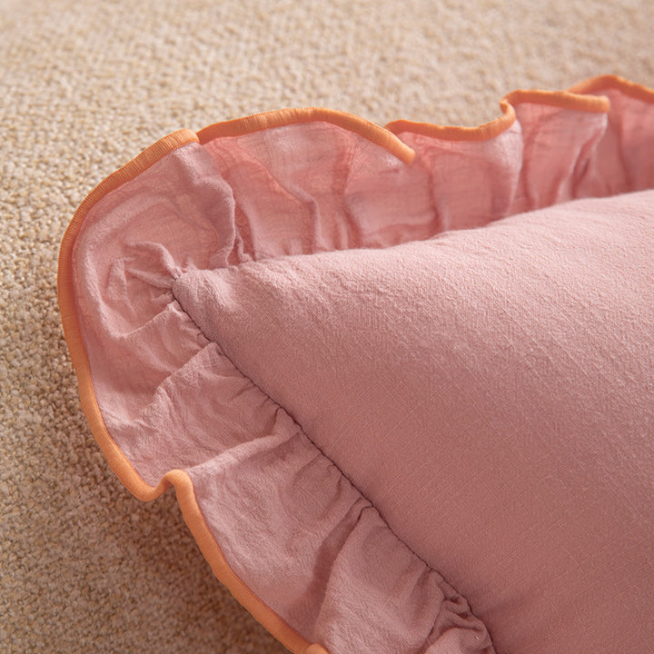 Square decorative pillow with ruffle and linen look