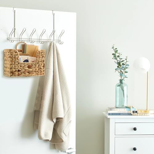 Wall shelf made of untreated wood with rattan inserts