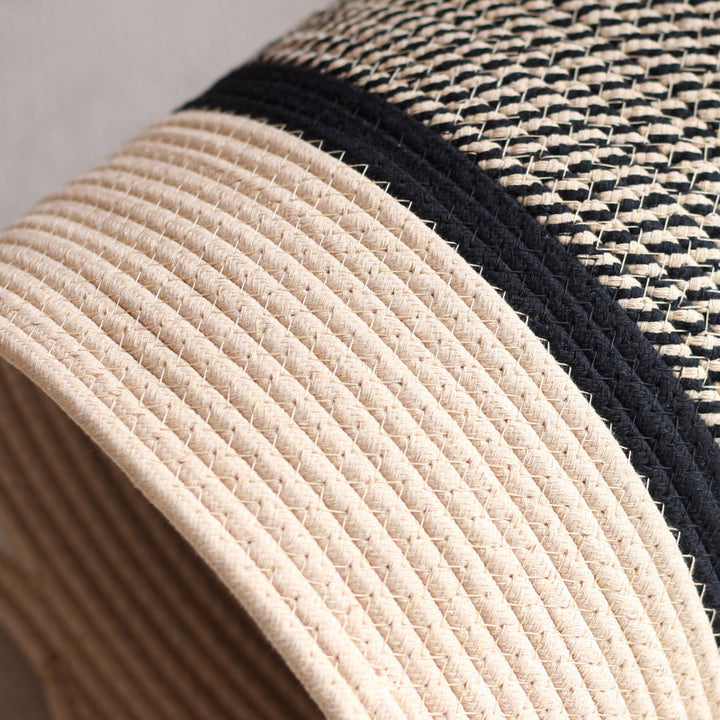 Decorative laundry basket made of woven material