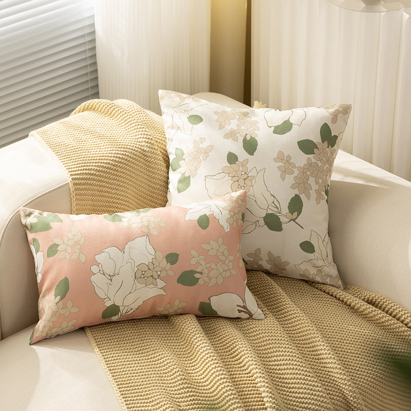 Rectangular decorative cushion with sketchy floral print and fine linen look