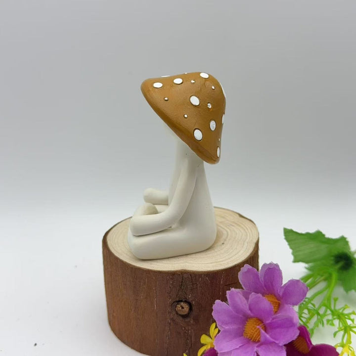 Decorative figure of a meditating mushroom